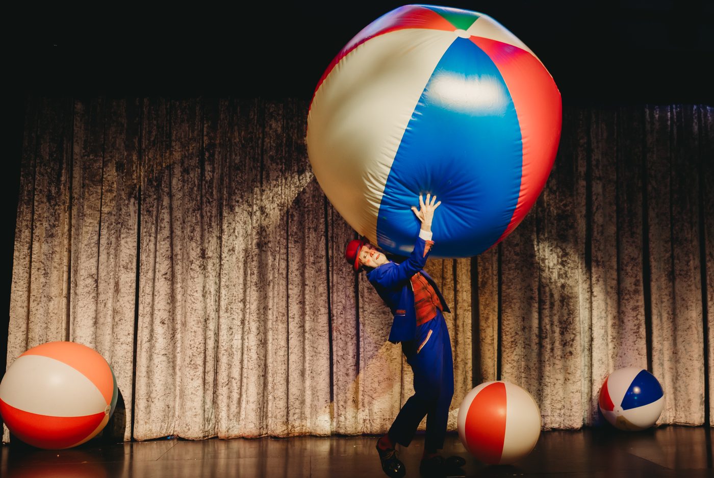 Lifting a giant beach ball on stage