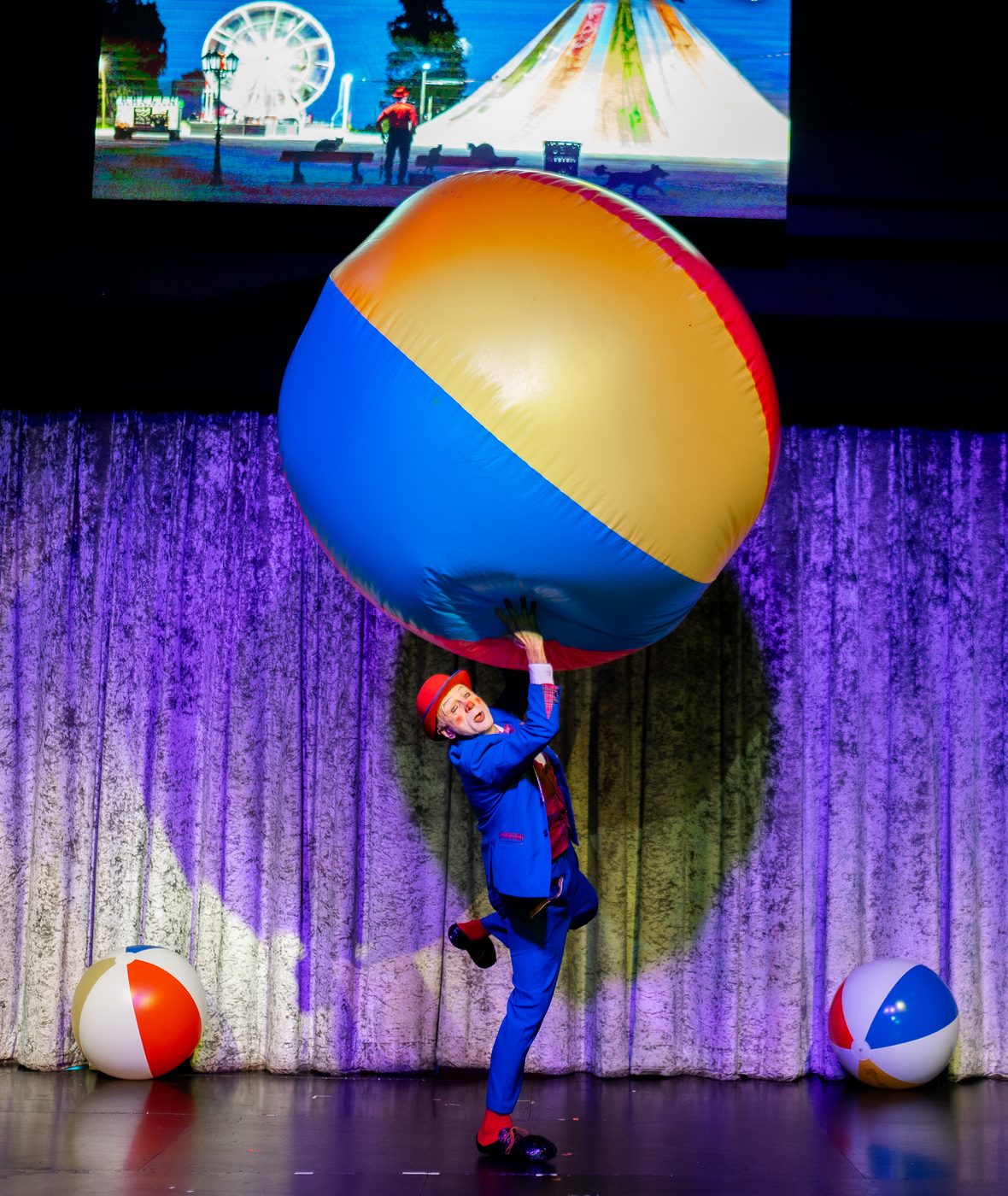 A giant ball balanced under the lights